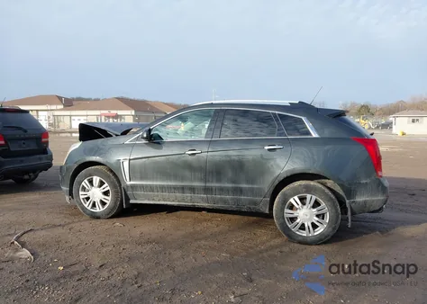 2016 Cadillac Srx Luxury Collection z USA, uszkodzony, nr VIN 3GYFNEE39GS570247